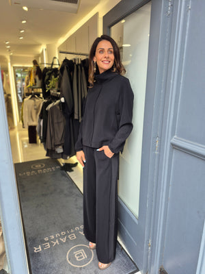 ania schierholt wide leg trousers in black