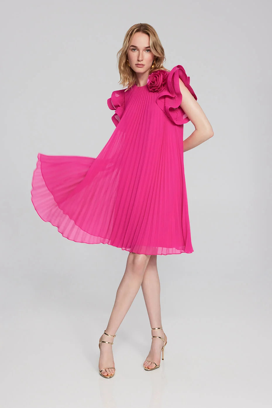 <p>Joseph Ribkoff hot pink chiffon pleat mini dress with horse hair ruffle sleeve and flower detail </p>