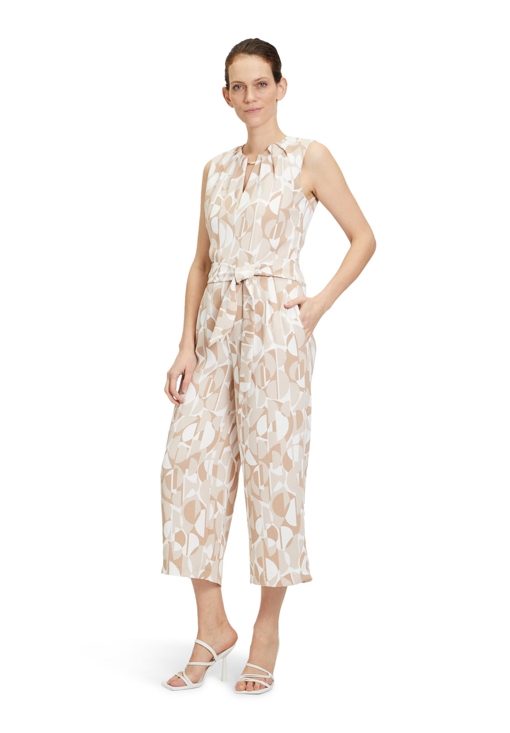 Betty & Co geometric print jumpsuit with wide culotte style legs and tie waist in beige and white

Product code 6460/3345