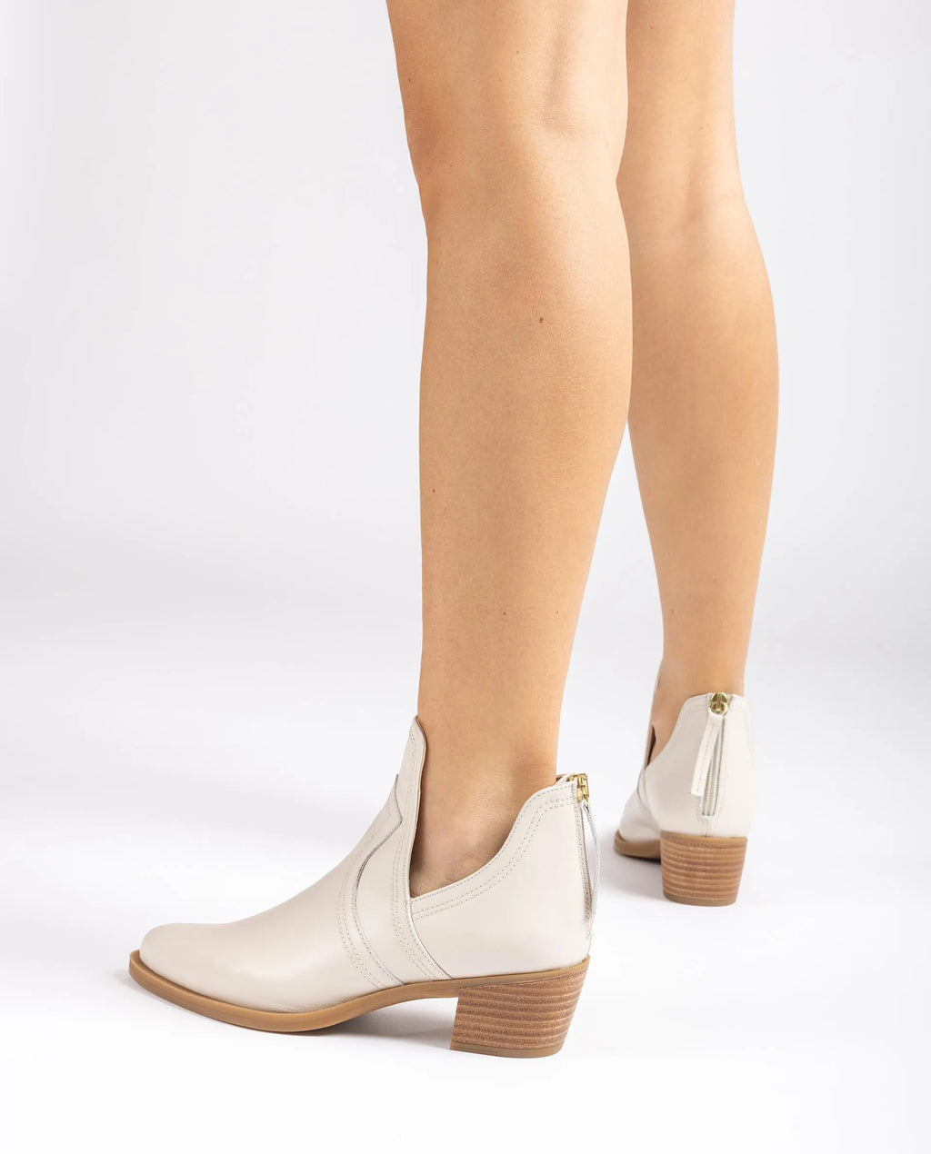 <p>Unisa Guisel cutout cowboy boots with low heel in ivory</p>