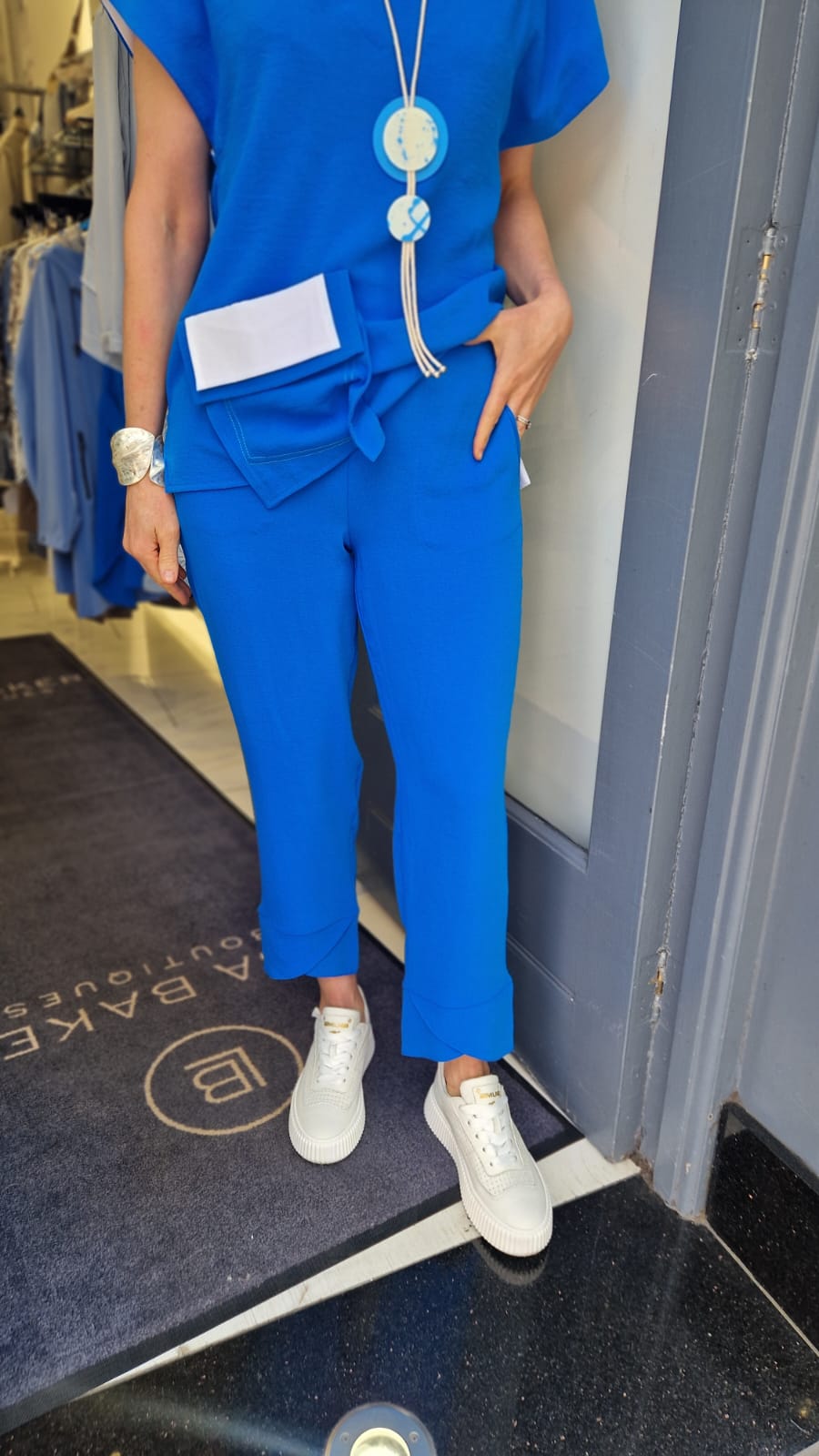 I.NCO wrap hem staight leg trousers in 7/8th length in blue. Product code 5101-29 (front)
