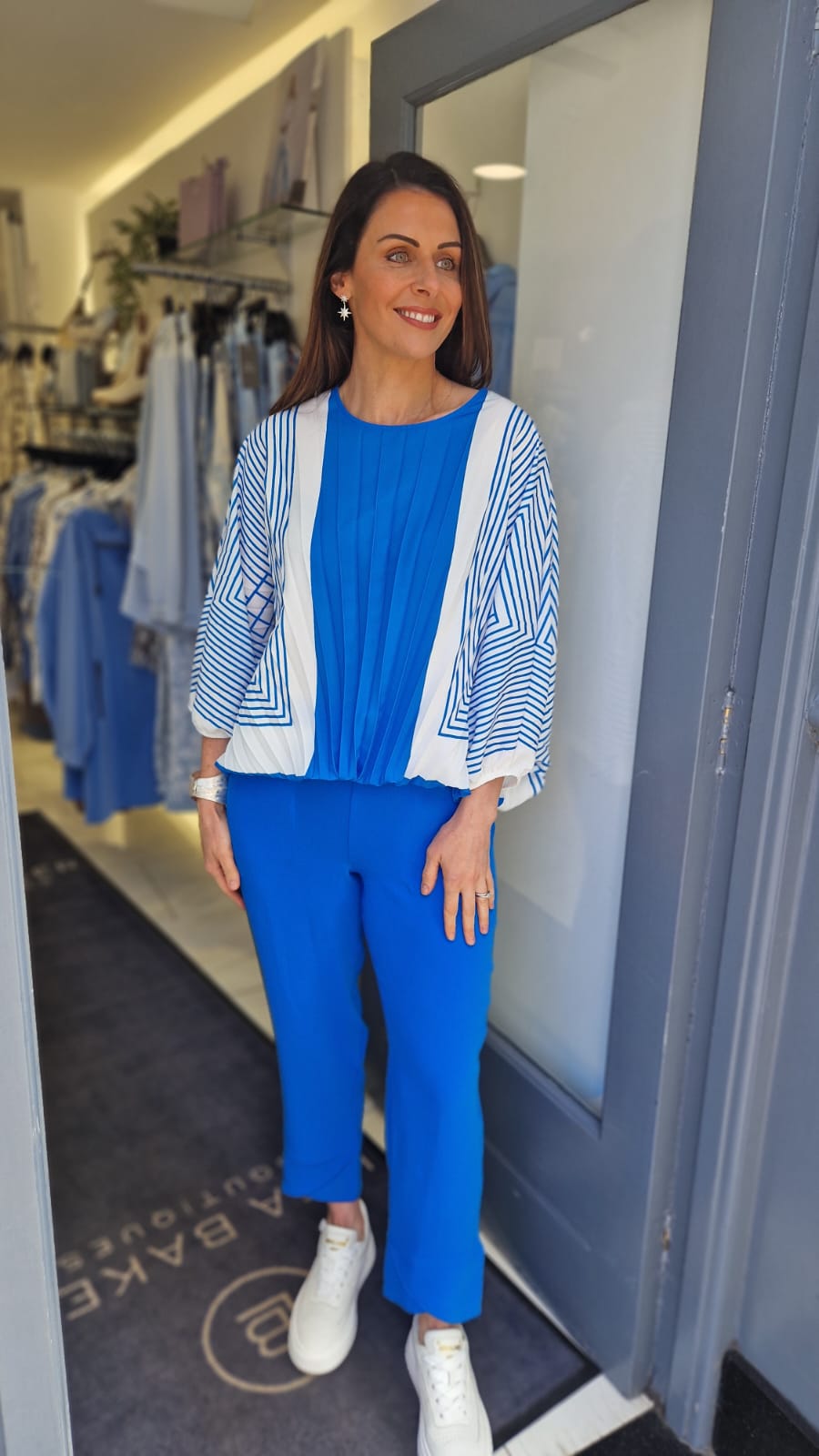 I.NCO pleated fan style blouse in blue and white with geometric print and cinch waistline. Product code 4228-05 (front)