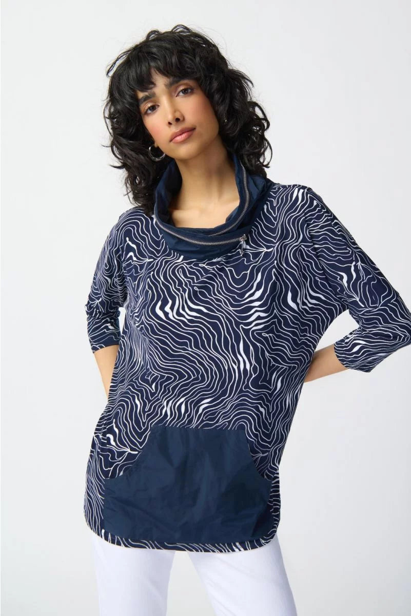 <p>Joseph Ribkoff wavy print top with large front pocket and cowl neck with zip details in navy and white</p>