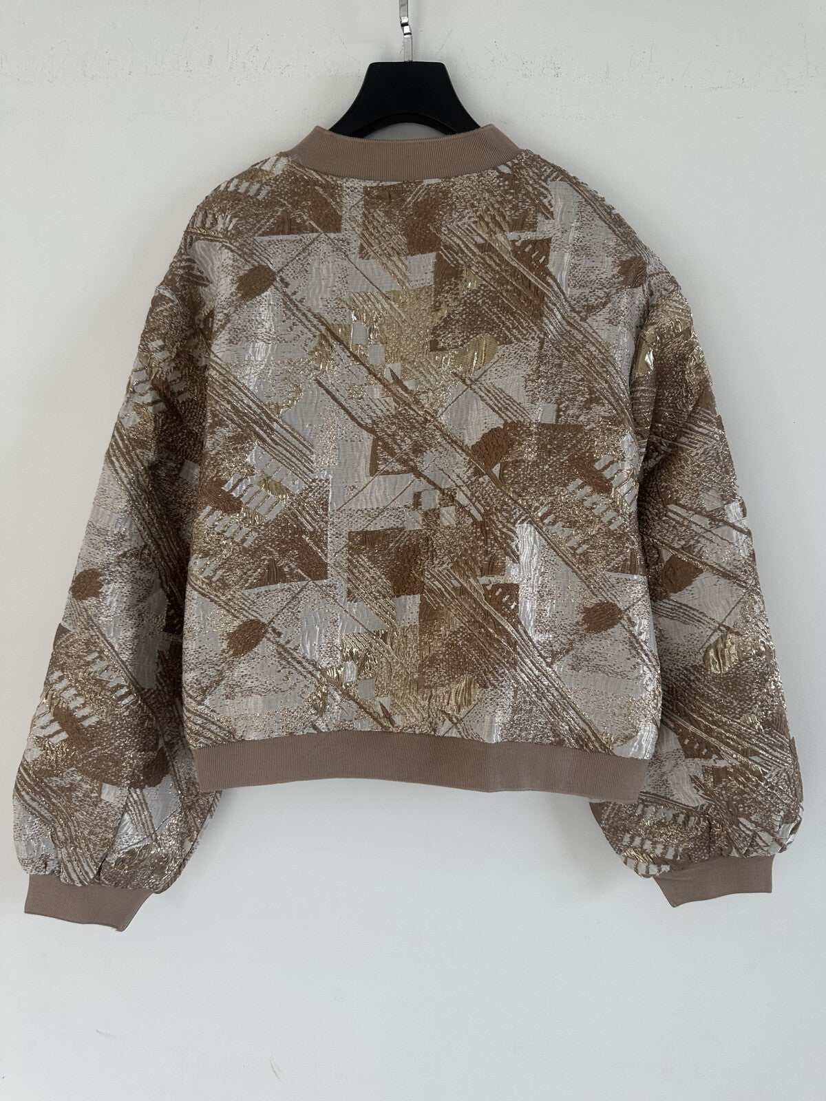 Shimmery bomber jacket in gold