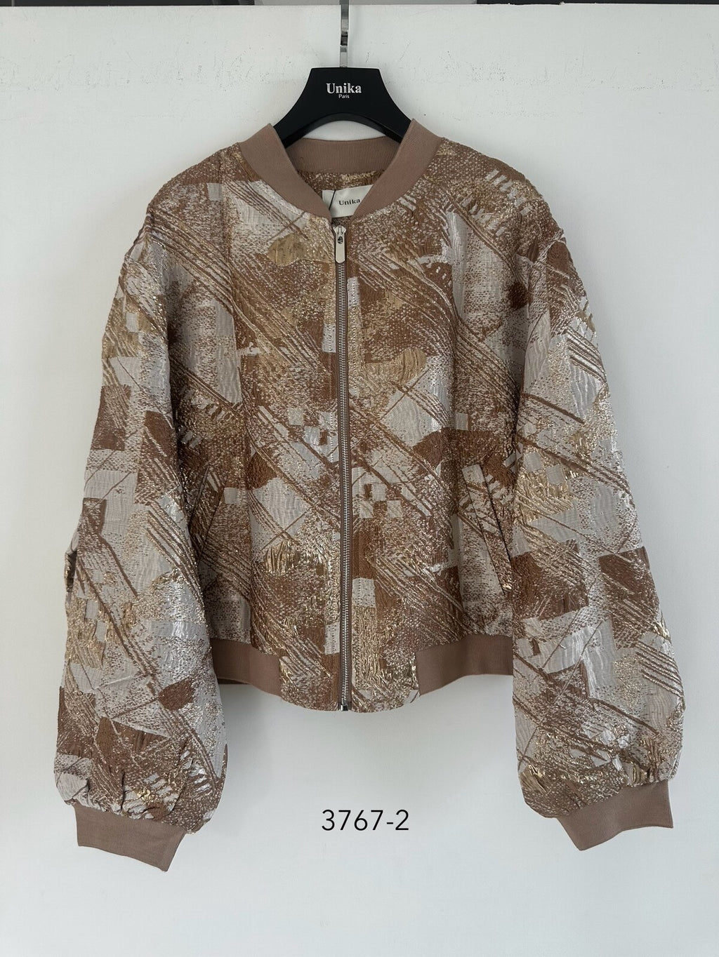 Shimmery bomber jacket in gold