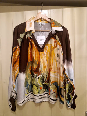 Deck silky blouse in chocolate print.