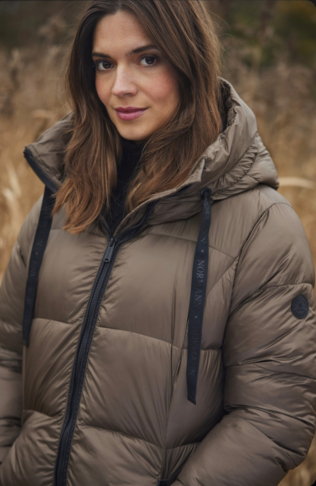 normann longline puffa coat in taupe